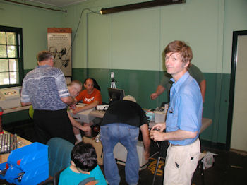 Lee Felsenstein autographs a few Osborne I portable computers.